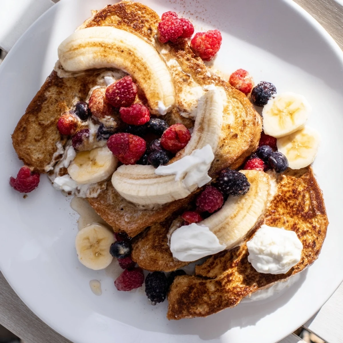 Fluffy Protein French Toast, cooked to perfection on a griddle, ready for your favorite additions.
