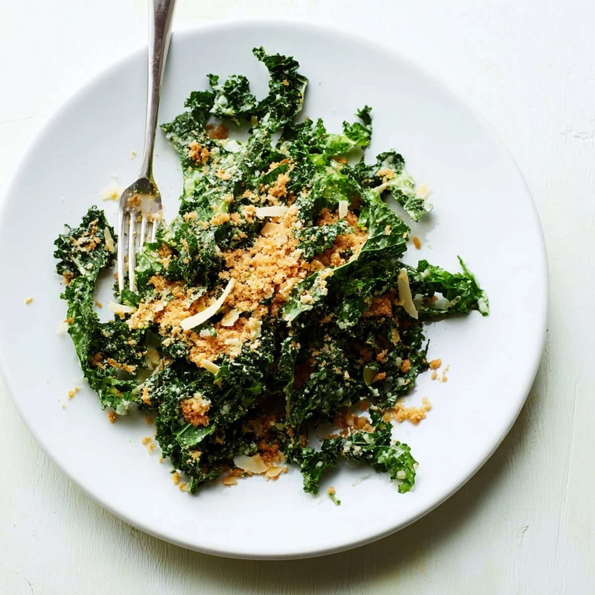 Massaged kale glistens with creamy garlic Parmesan dressing in this vibrant Garlic Parmesan Kale Salad, topped with golden toasted breadcrumbs.