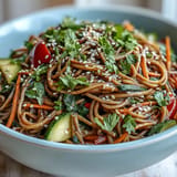Refreshing cold soba noodle salad, tossed with crunchy vegetables and nutty sesame.
