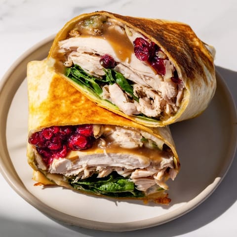Golden-browned Moist Maker Chicken Wrap, showcasing a cross-section revealing savory chicken and stuffing layers.