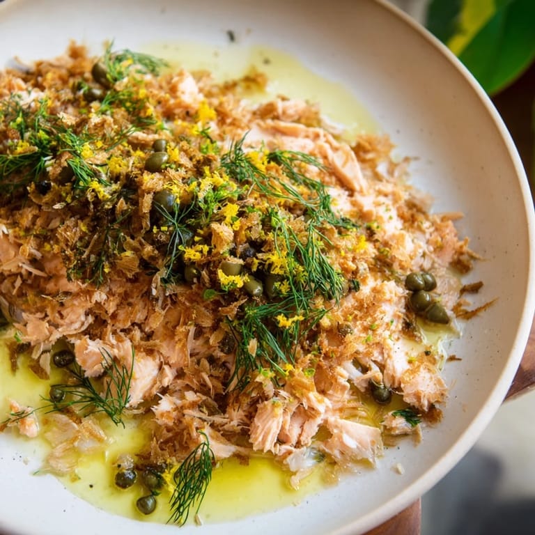 Golden, pan-seared Simple Fork-Friendly Lemon-Herb Tilapia, drizzled with a bright lemon caper sauce, ready to serve.