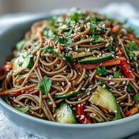 Chilled soba noodle salad with bright veggies and zesty sesame ginger dressing.